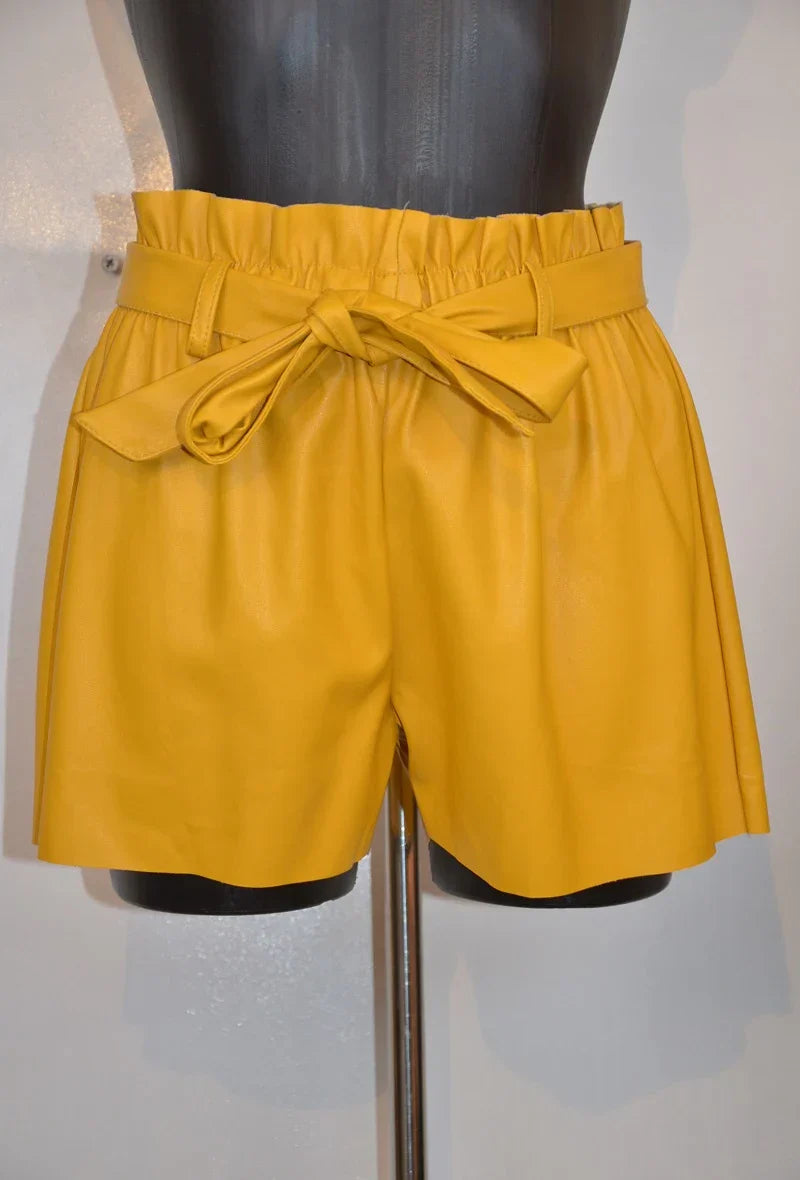 High-waisted faux leather shorts with tied belt